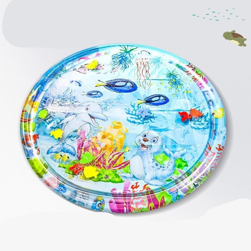 Round seal dolphin inflatable play mat with ocean-themed design on a white background